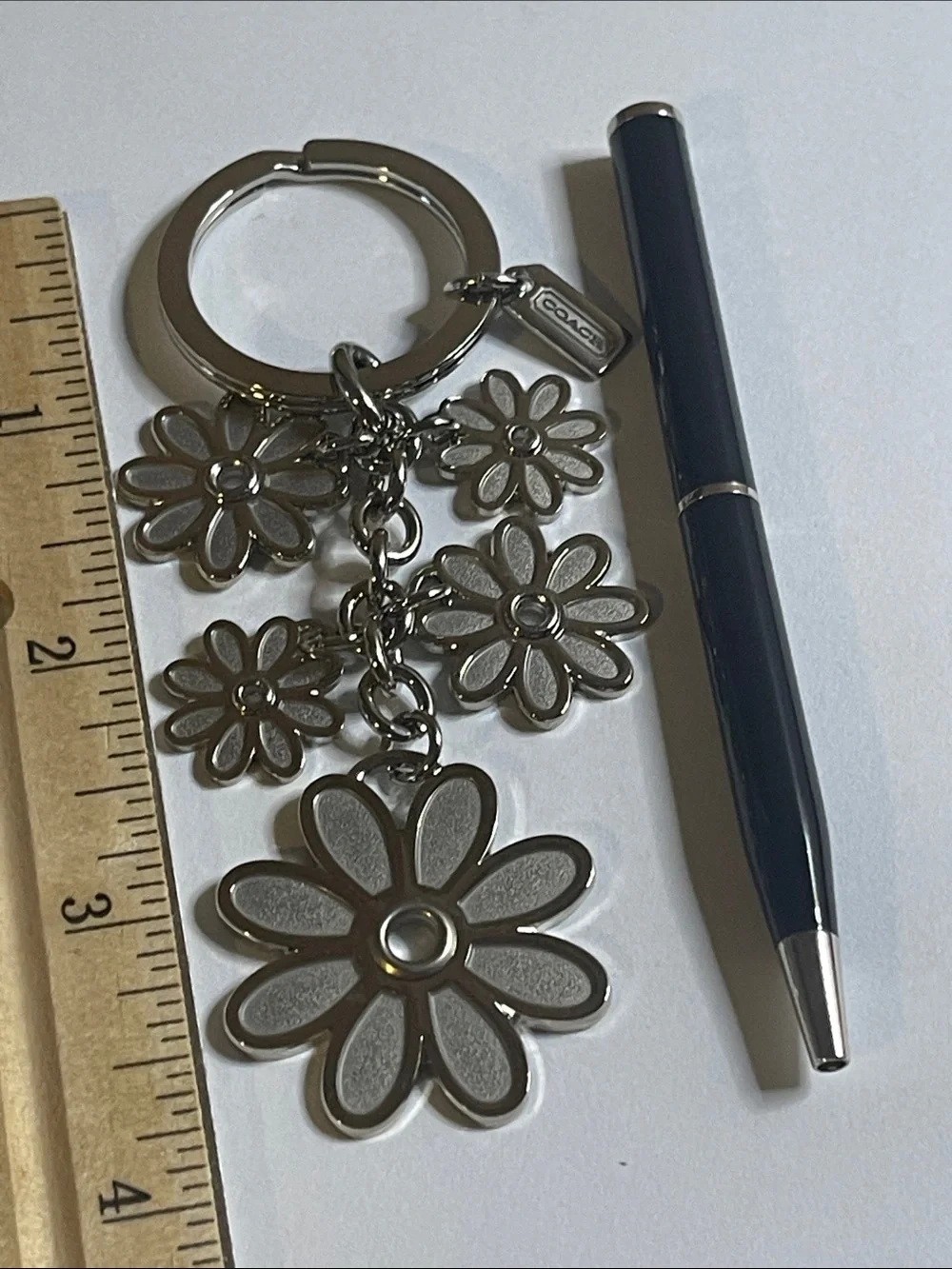 Coach Silver Daisy Charm Keychain and Coach Pen